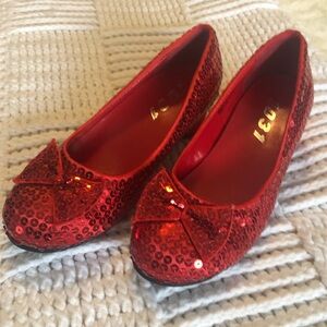 Child’s red heeled Dorothy shoes
